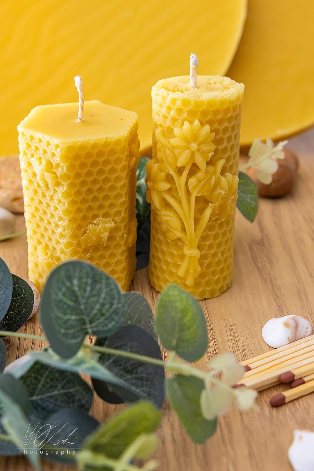 Beautiful beeswax candles with intricate designs, perfect for creating a cozy atmosphere. Buy pure honey for sale.